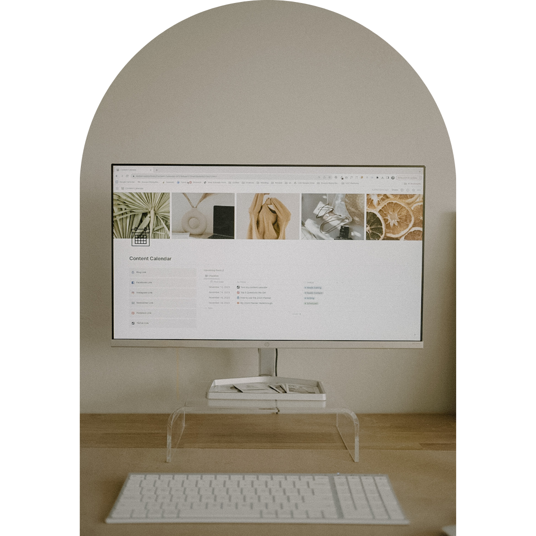 A computer monitor with a content calendar notion template on the screen