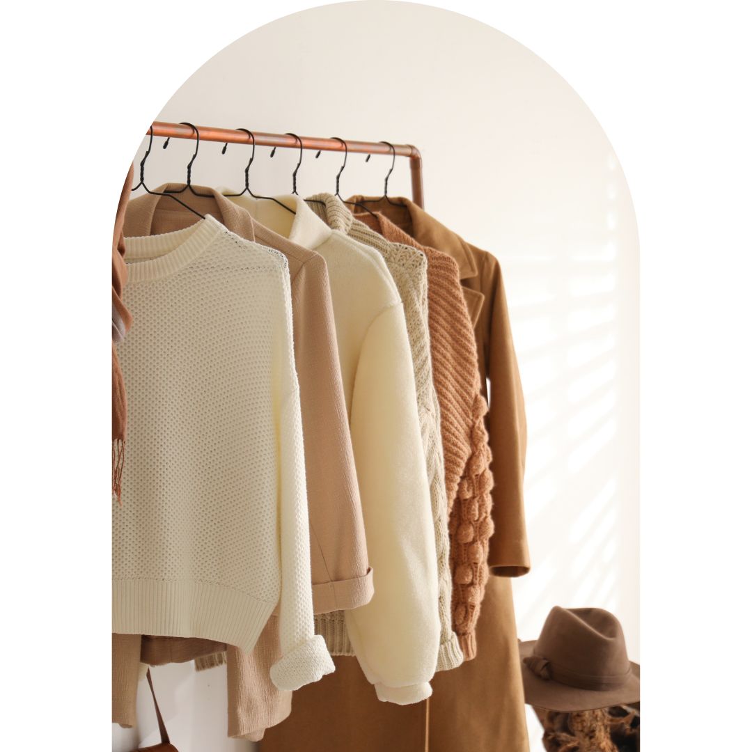 Rack of neutral colored clothing for a personal branding photoshoot